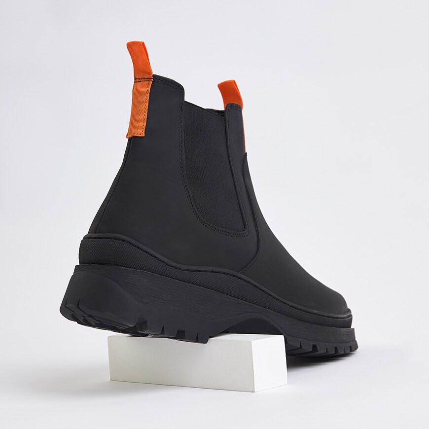 ASOS DESIGN Chelsea boots with orange heel tab detail available at ASOS | ASOS Style Feed