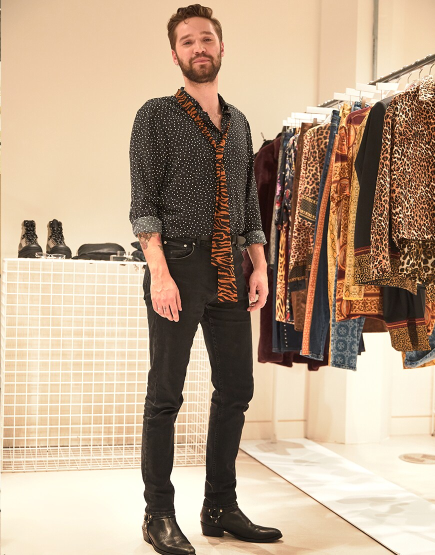 Gabriele wearing a spotted shirt, animal-print tie, jeans and ankle boots | ASOS Style Feed
