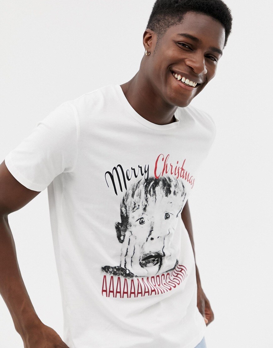 A model wearing a Jack & Jones Home Alone T-shirt available at ASOS | ASOS Style Feed