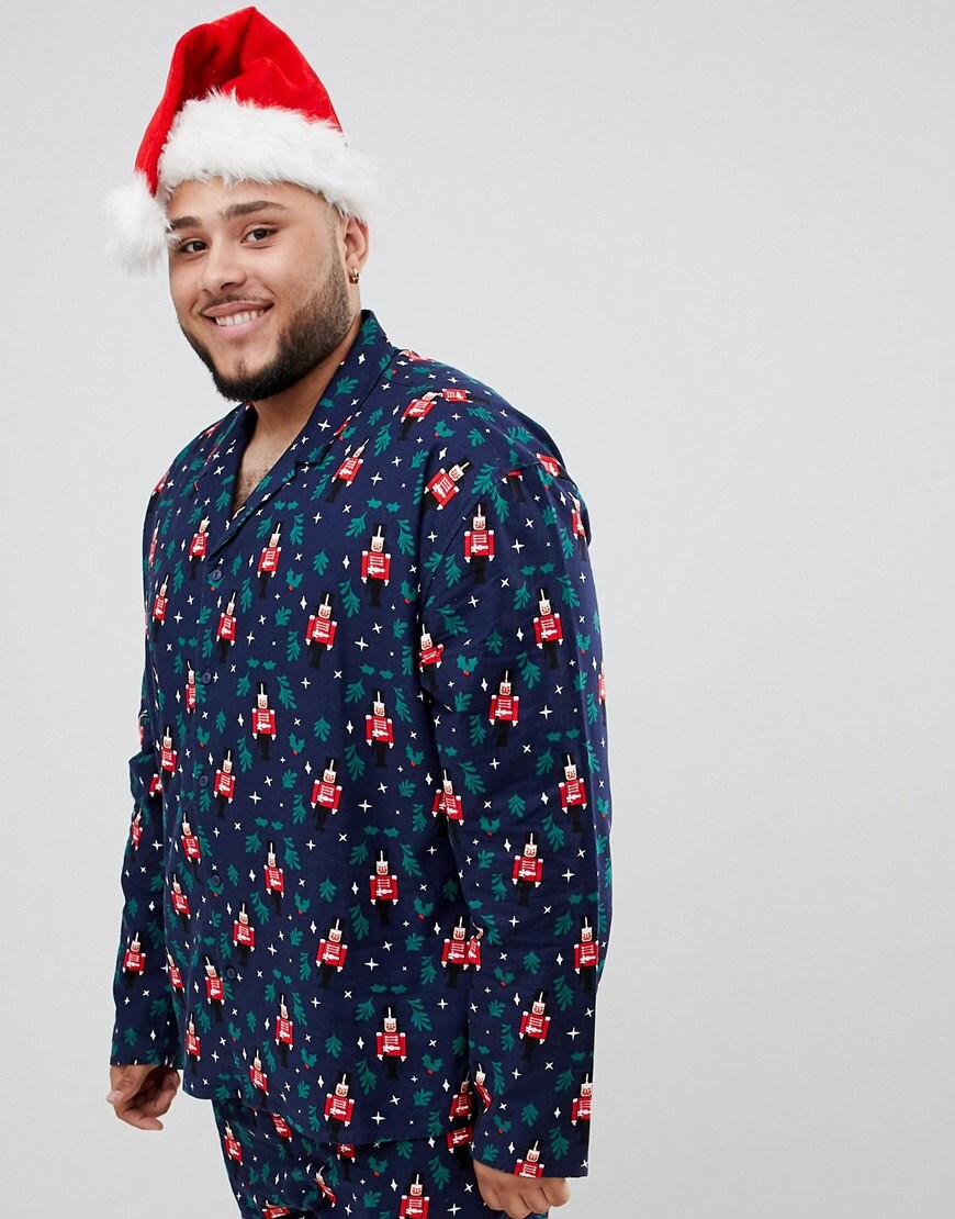 A model wearing the ASOS DESIGN Mr & Mrs Christmas woven pyjama set available at ASOS | ASOS Style Feed