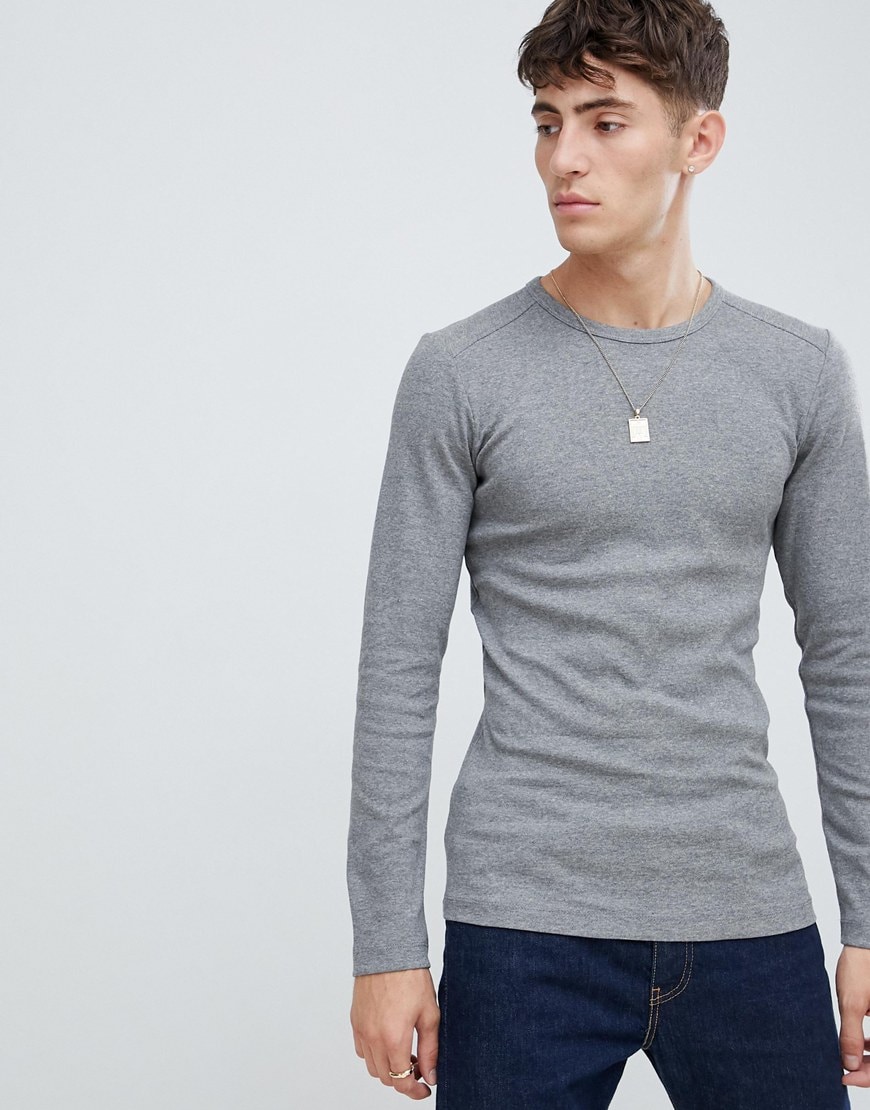  A picture of a model wearing a long-sleeve T-shirt made from organic cotton. Available at ASOS.
