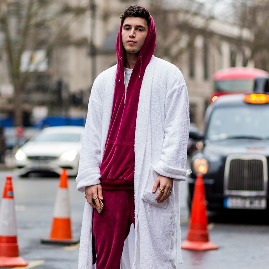 A street-styler wearing a velour tracksuit and white robe | ASOS Style Feed