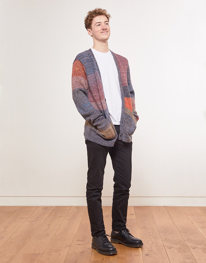 Steven wearing a white T-shirt, cardigan, jeans and lace-up shoes | ASOS Style Feed