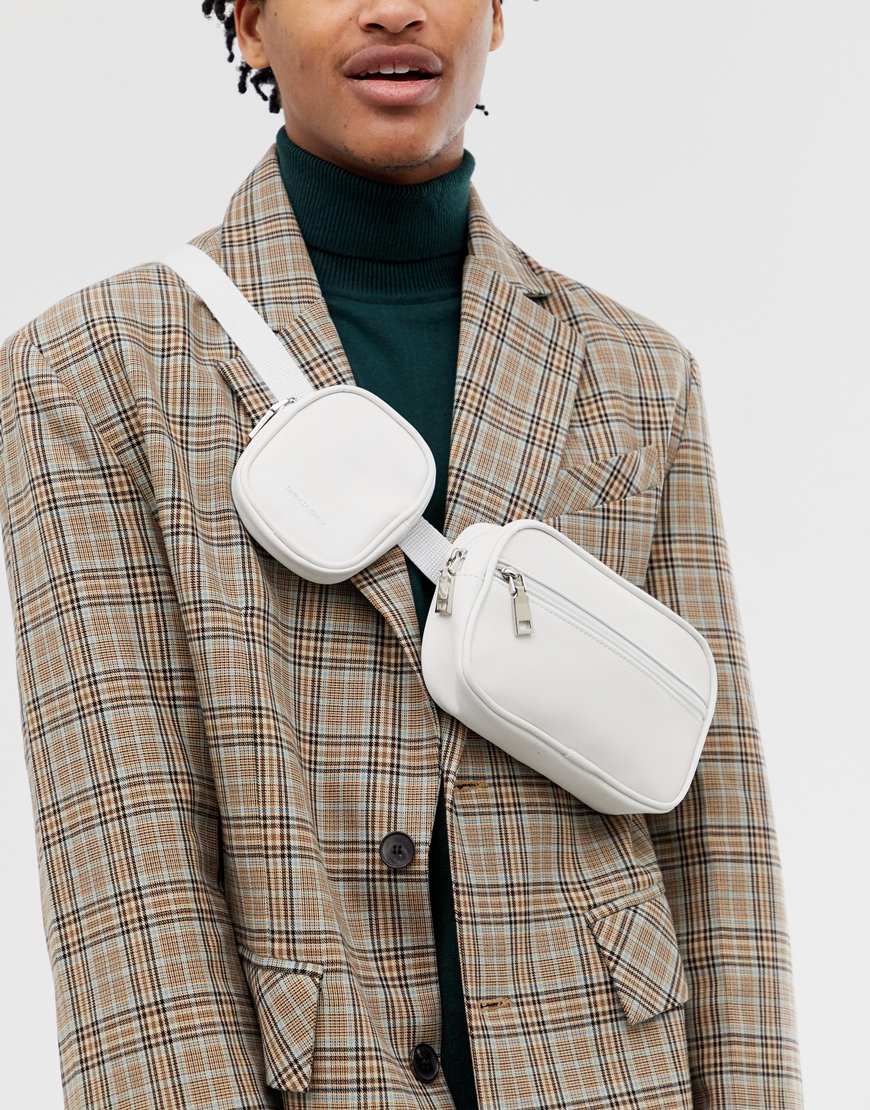 A picture of a white faux-leather waistpack, worn cross-body by ASOS DESIGN. Available at ASOS.