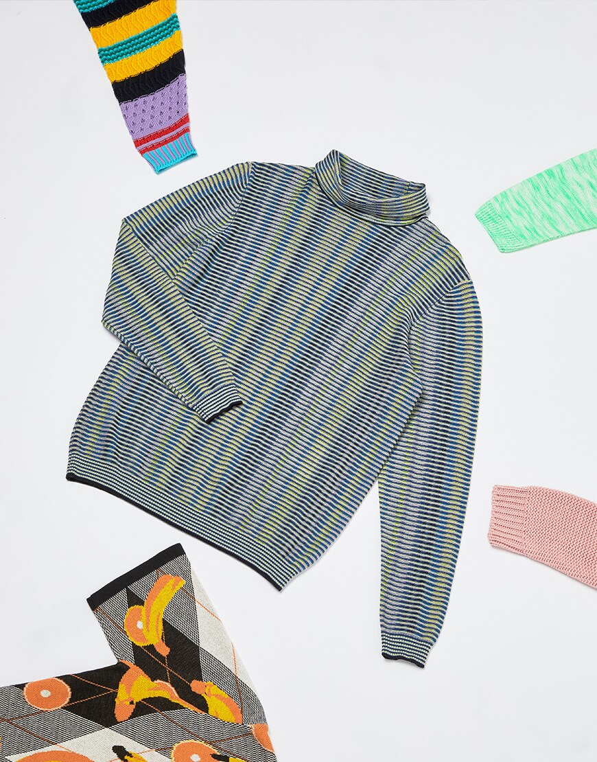 A picture of a ribbed roll-neck jumper in a blue, yellow and grey colourway. Available on ASOS.