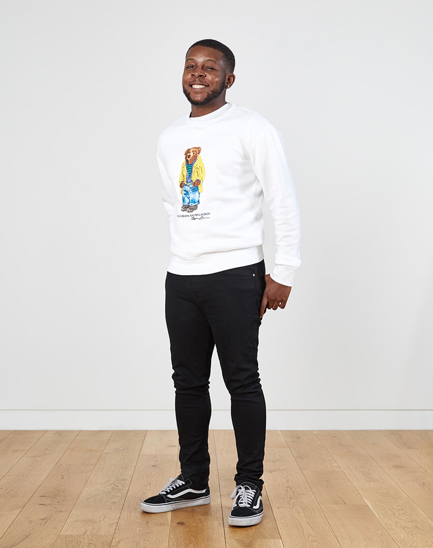A picture of a man wearing a white sweatshirt from Polo Ralph Lauren, available at ASOS.