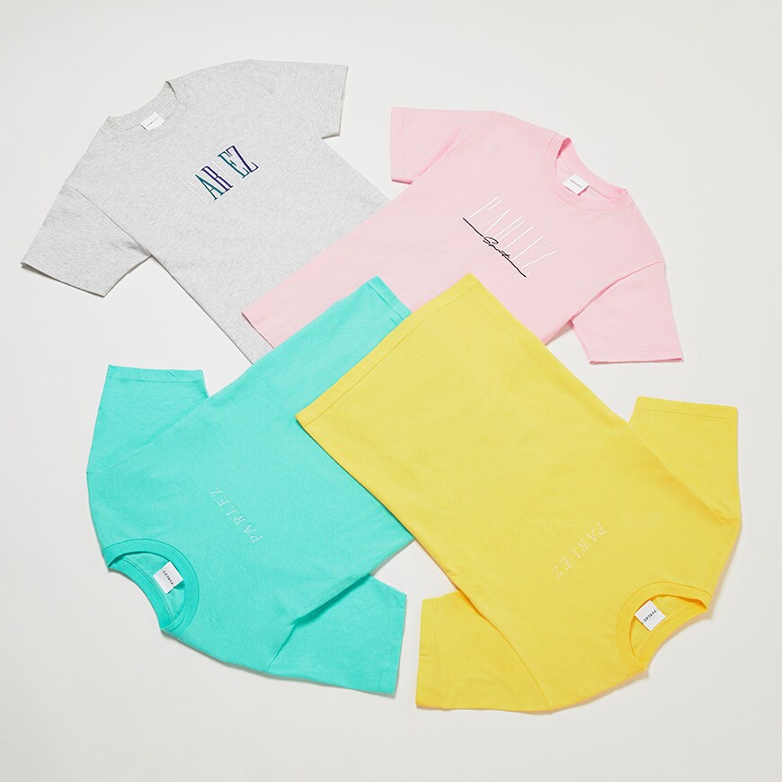 A picture of four colourful T-shirts from streetwear brand Parlez. Available at ASOS.
