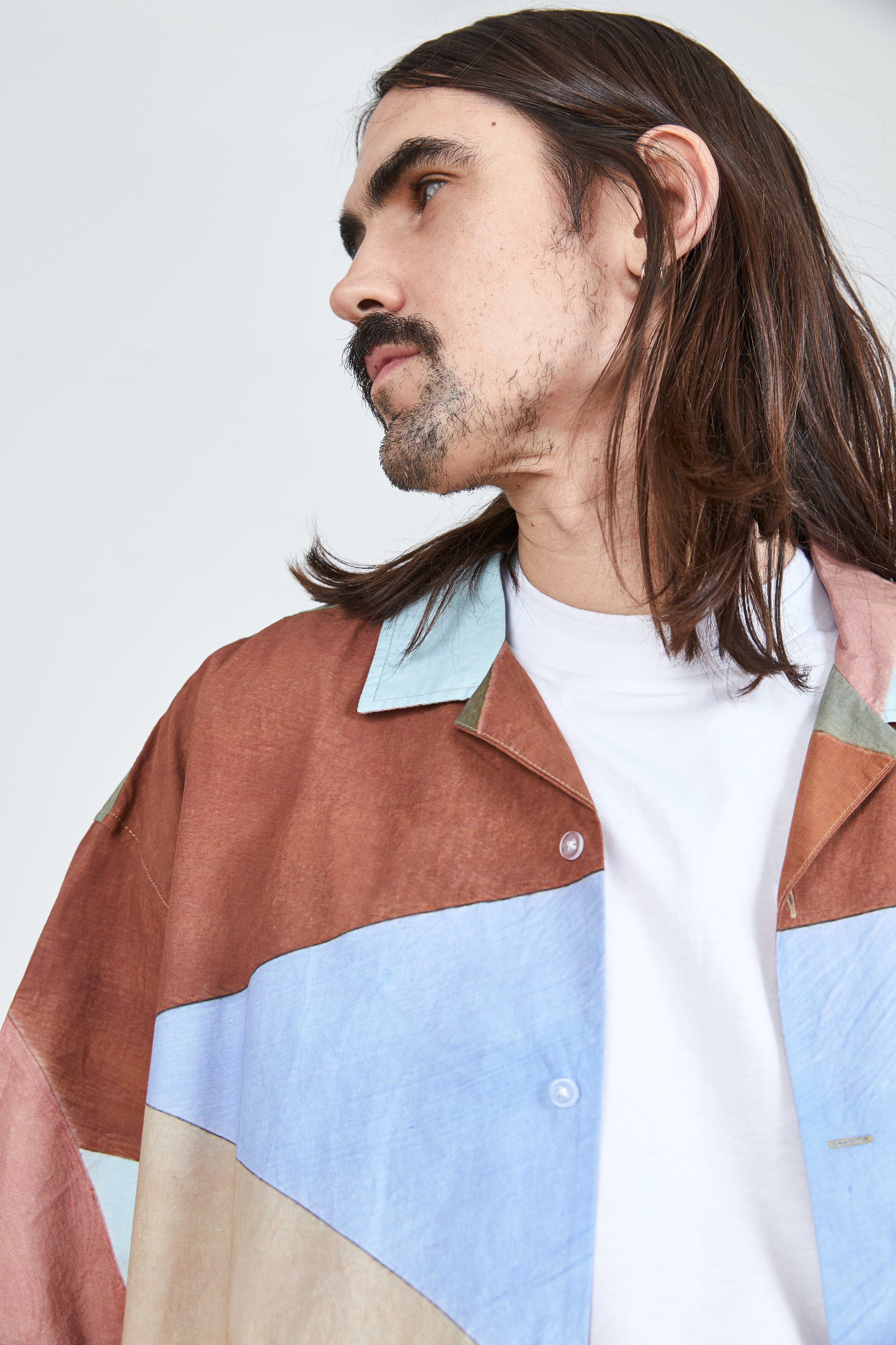 A close up picture of a multi-colour short sleeve shirt. Available at ASOS.