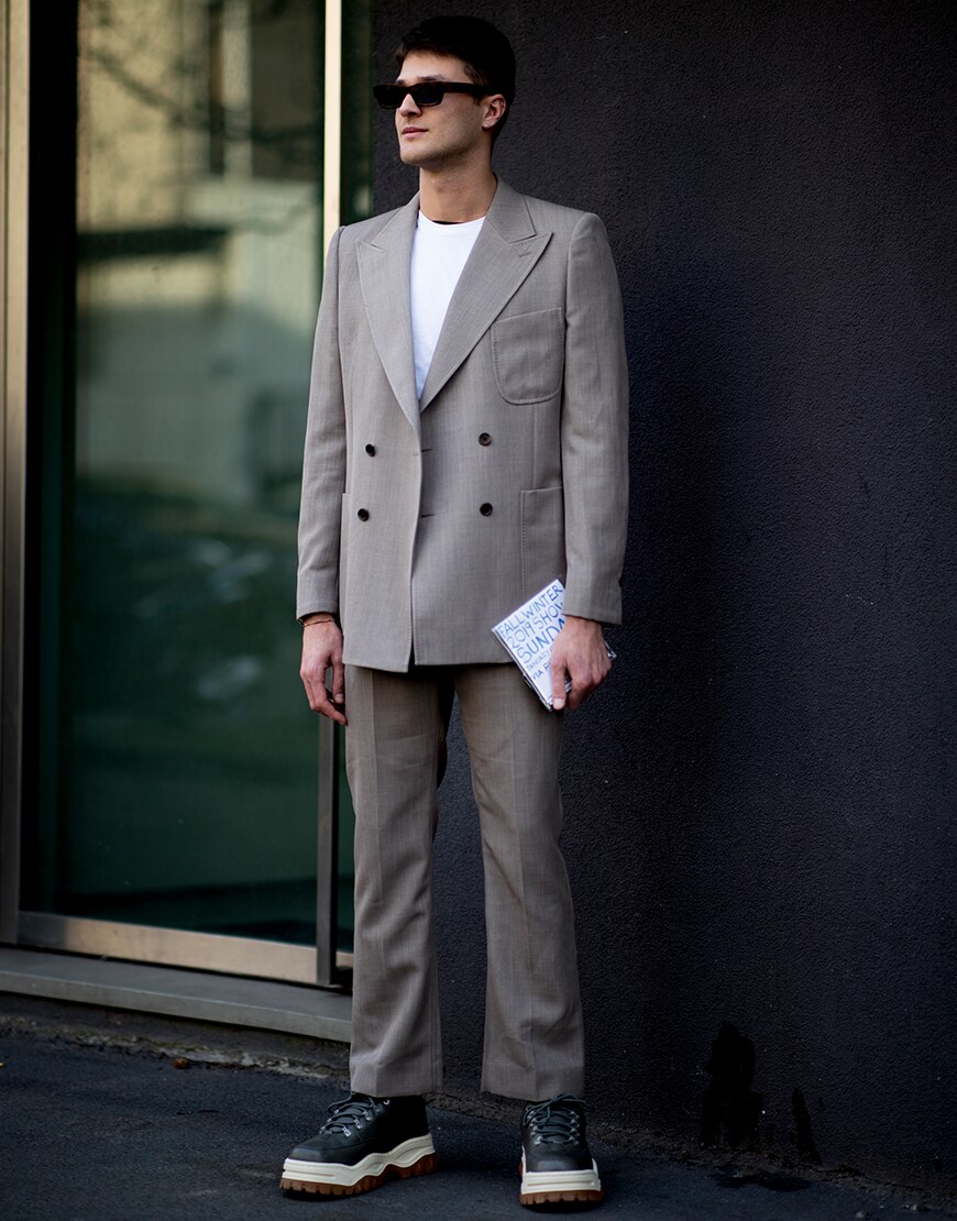 A street-styler wearing a relaxed-fitting suit  | ASOS Style Feed