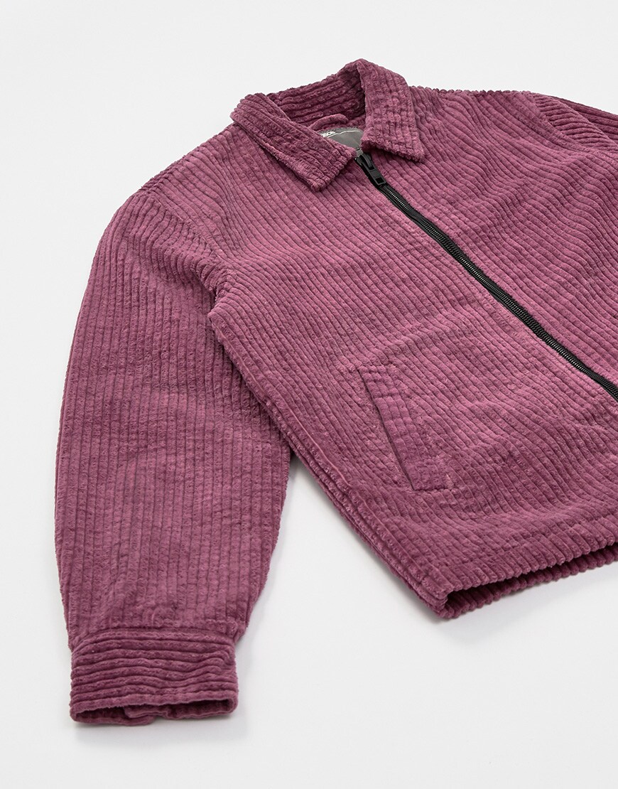 A close-up picture of a purple corduroy jacket. Available at ASOS.