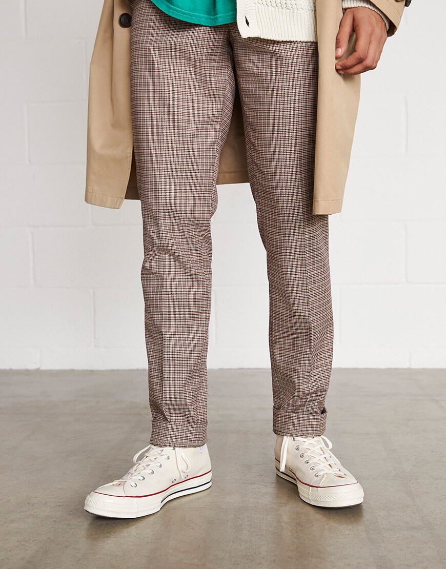 A close up picture of a man wearing a grandadcore-inspired outfit. Available at ASOS.