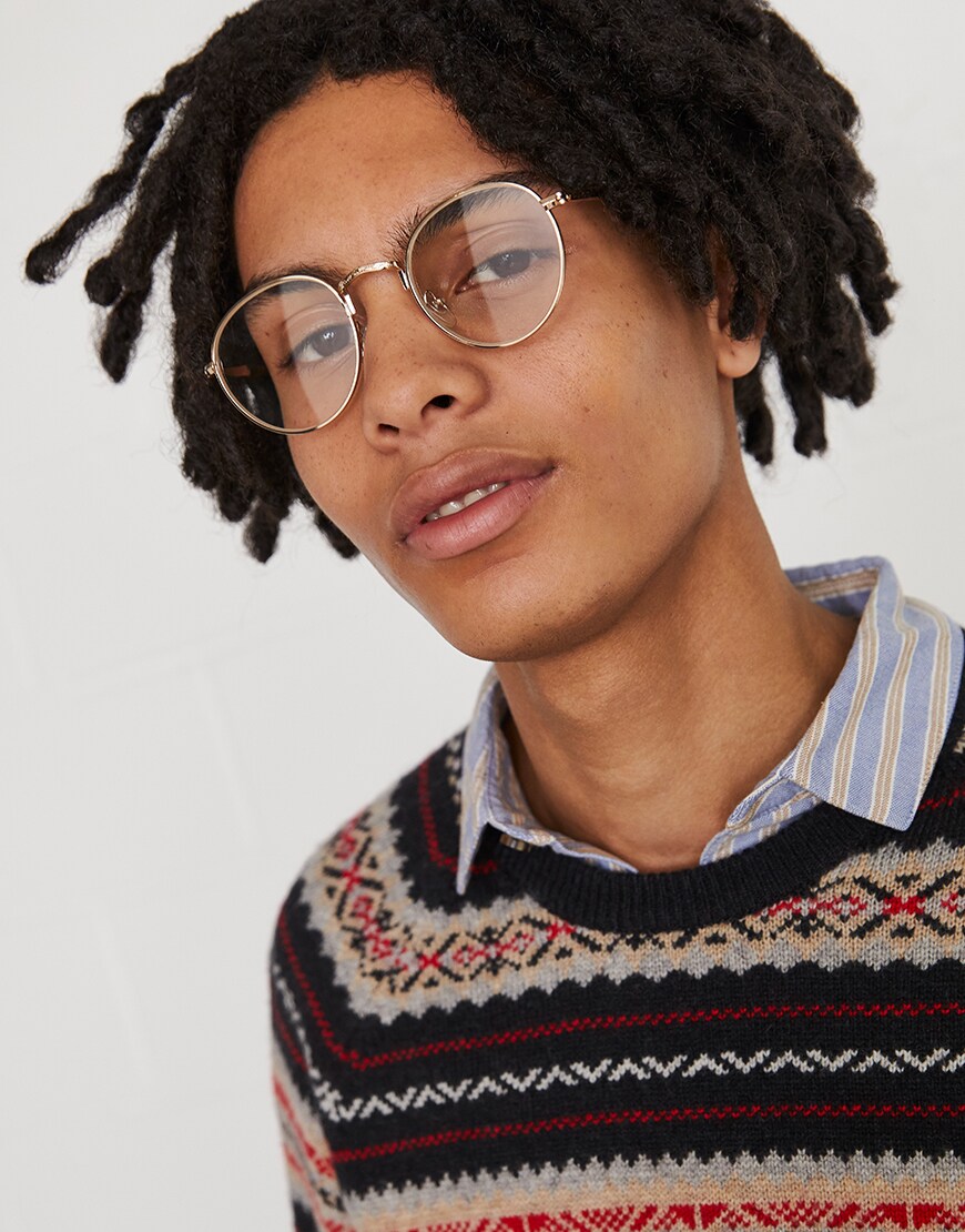 A close up picture of a man wearing a grandadcore-inspired outfit. Available at ASOS.