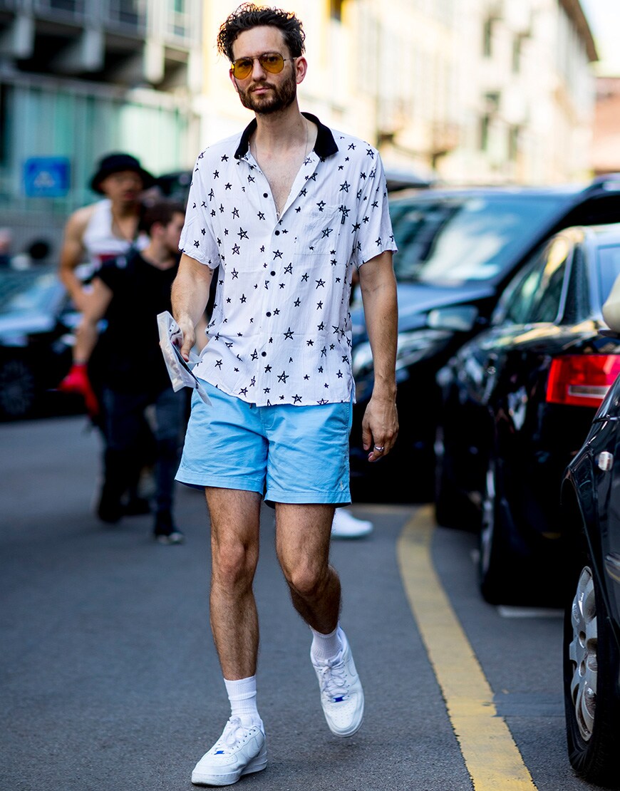 Man in Milan wearing shorts 