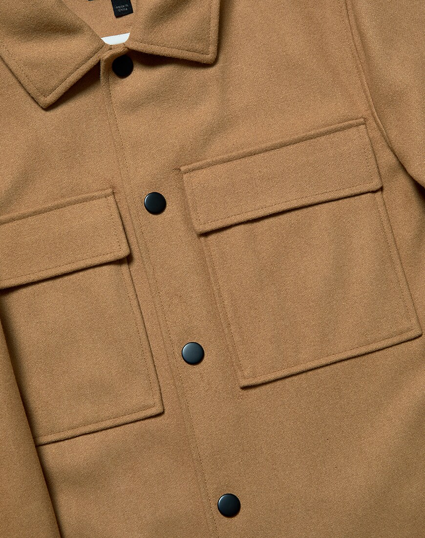 A close up picture of a wool-mix shacket by ASOS DESIGN. Available at ASOS.