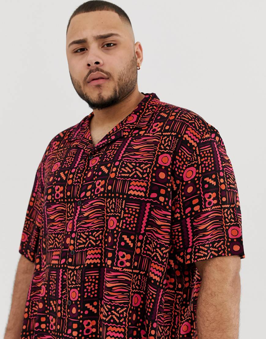 A picture of a man wearing a plus-size shirt with a vintage-style print. Available at ASOS.