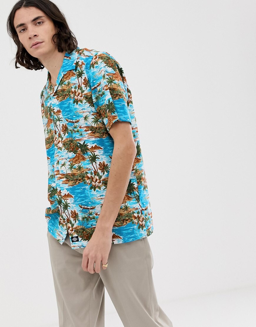 A picture of a man wearing a blue Hawaiian shirt, available at ASOS.