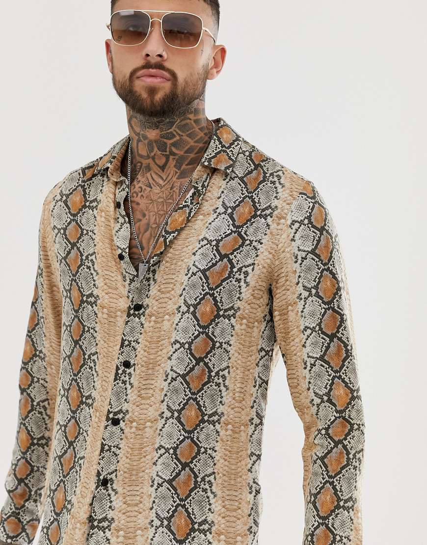 A picture of a man wearing a snakeskin print shirt. Available at ASOS.