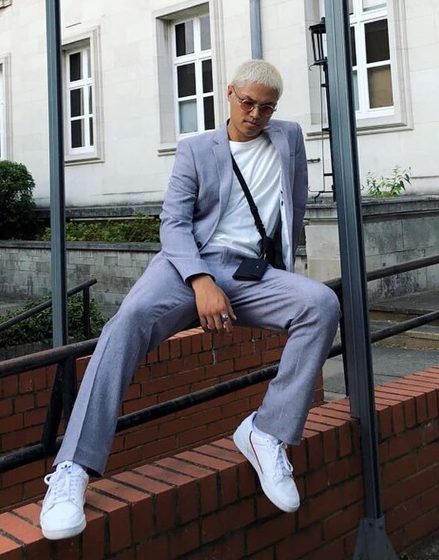 ASOS Insider Nawal wearing a grey suit with a white tee and sneakers | ASOS Style Feed