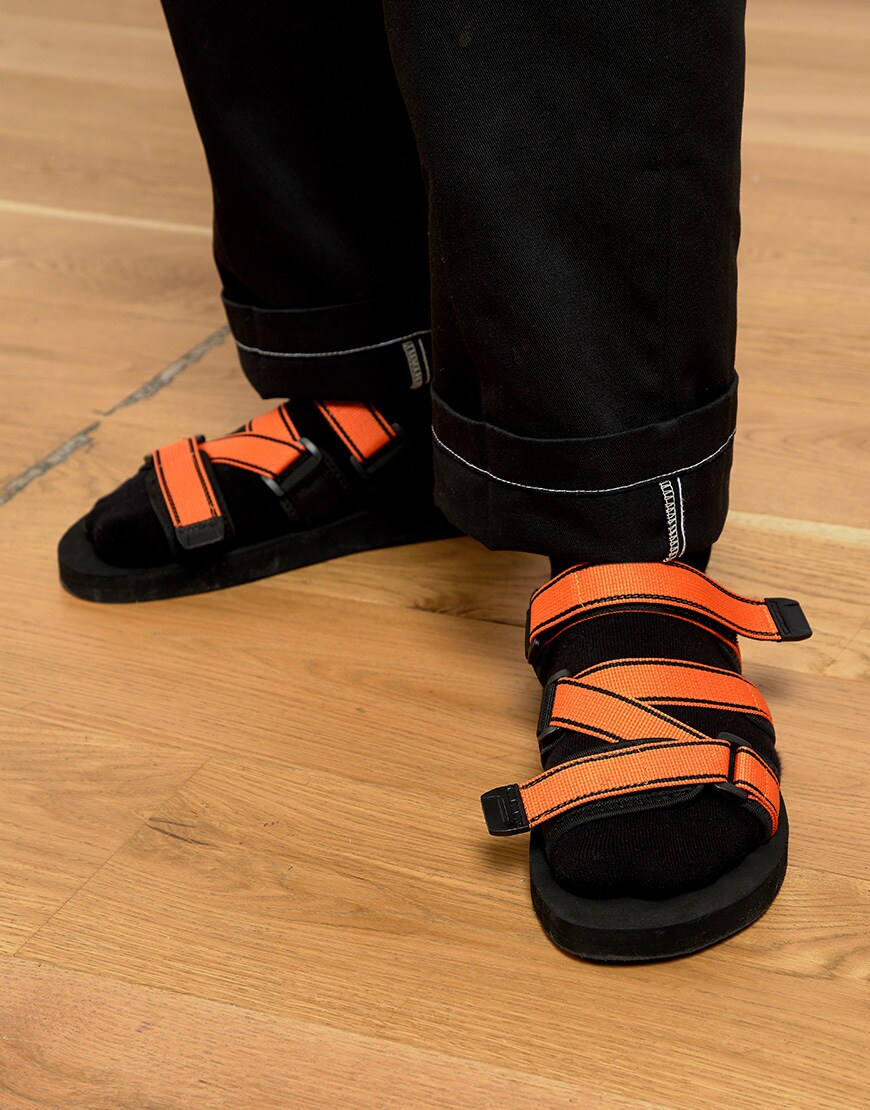 a picture of a pair of black sporty-style sandals. Available at ASOS.