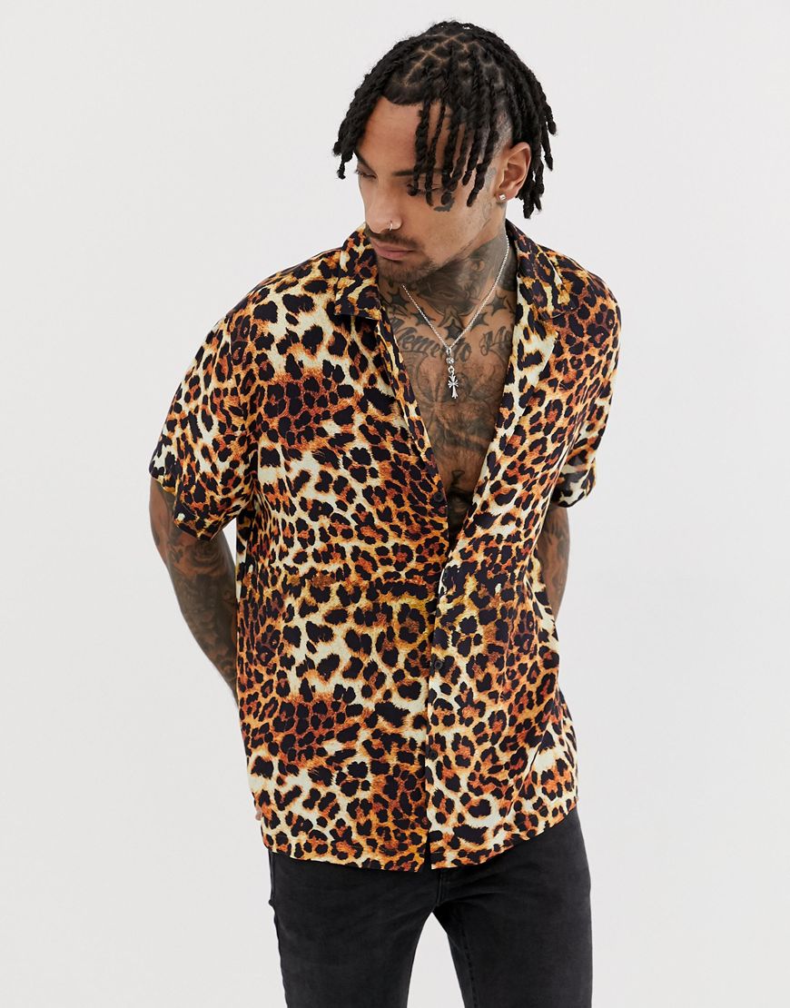 A picture of a model wearing a leopard print shirt. Available at ASOS.