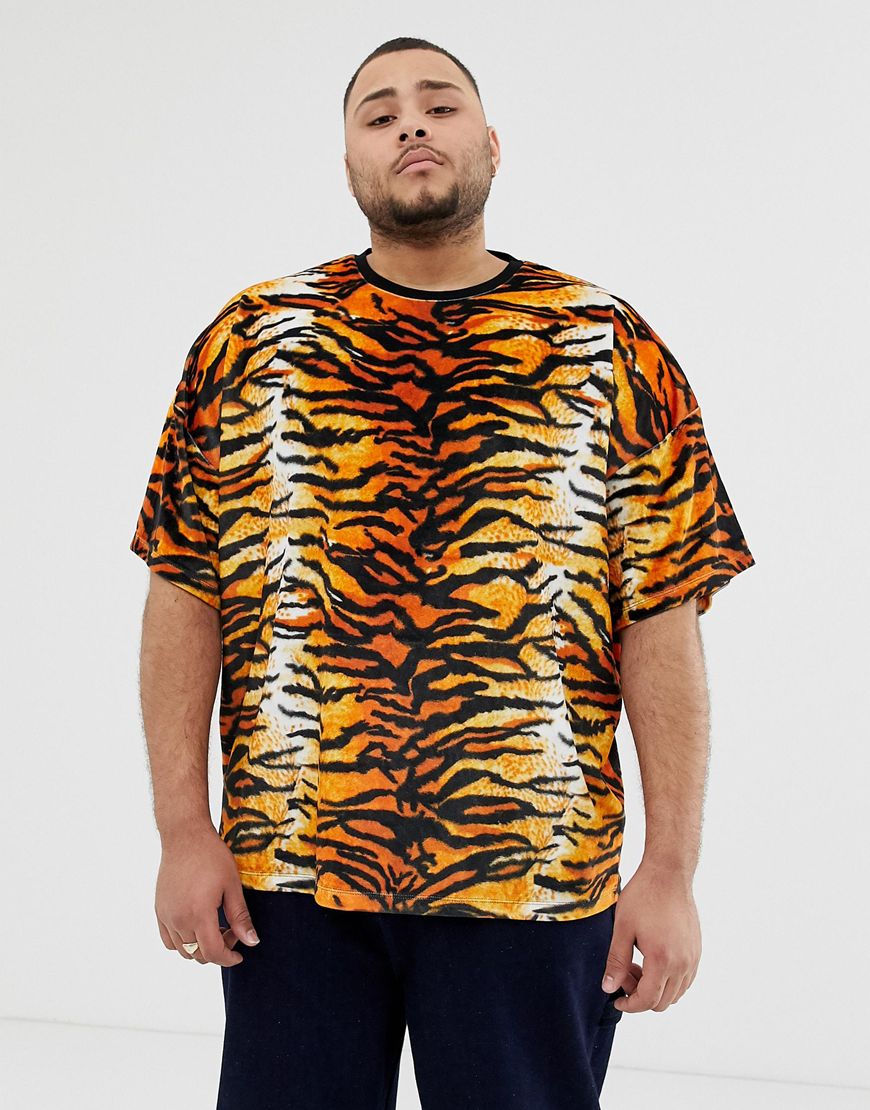 A picture of a plus-size model wearing a tiger-stripe T-shirt. Available at ASOS.