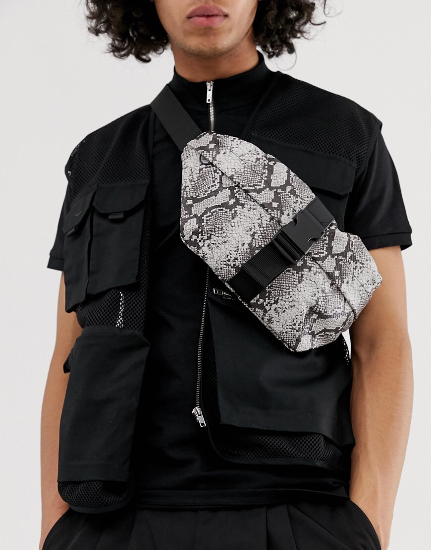 A picture of a snakeskin print cross-body bag. Available at ASOS