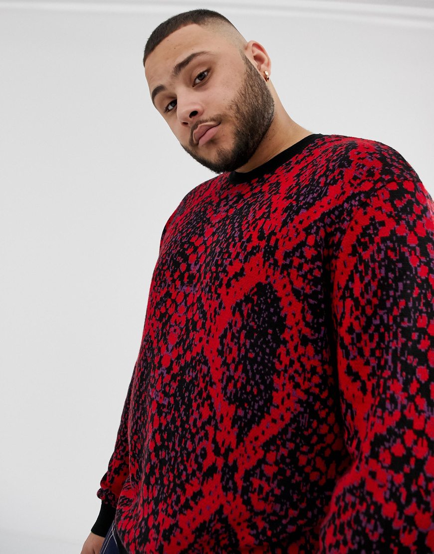 A picture of a plus-size model wearing a tiger-stripe jumper. Available at ASOS.