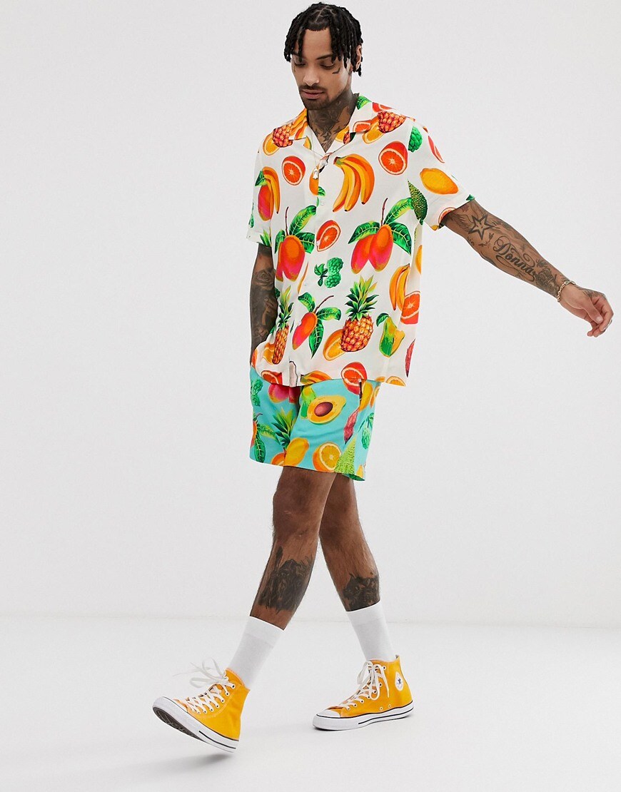 A picture of a model wearing a fruit-print co-ord. Available at ASOS.