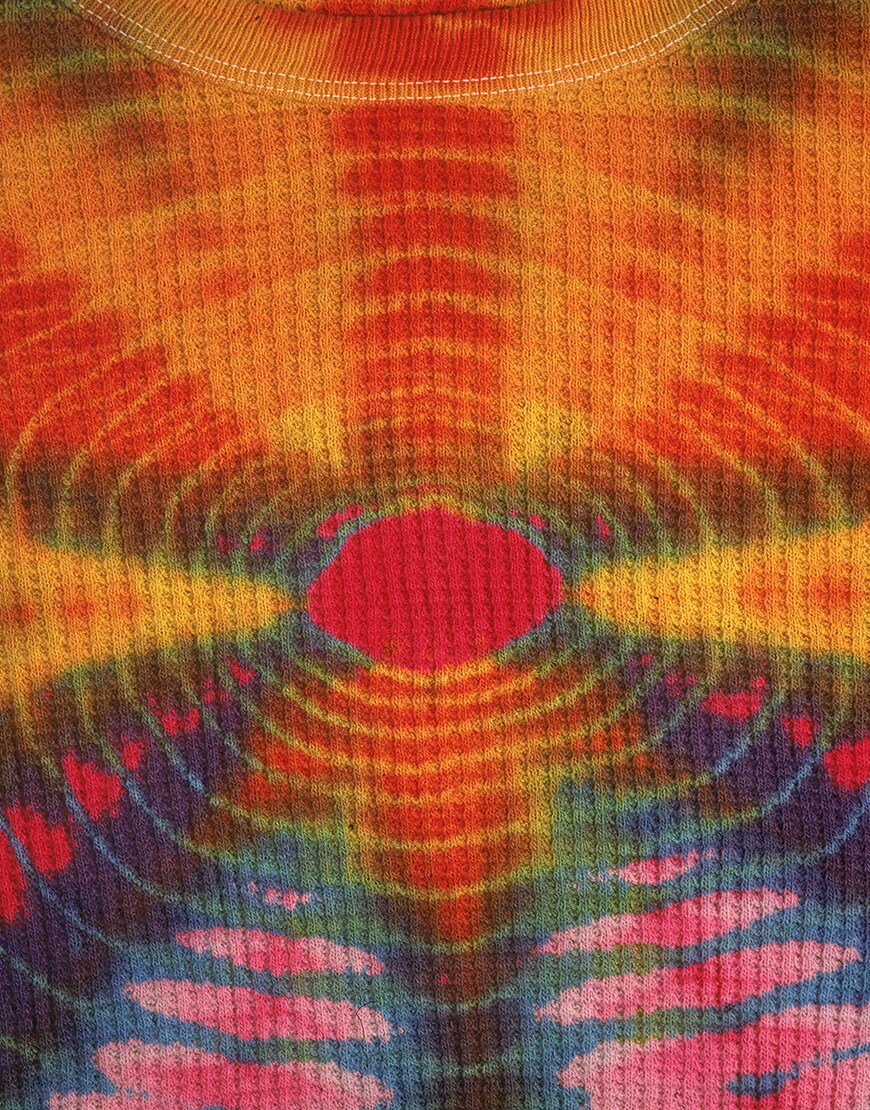 A close-up picture of a tie-dye T-shirt.