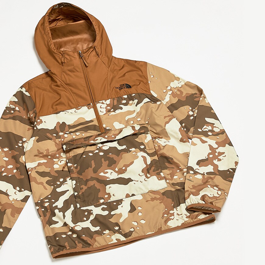A picture of a camo-print rain jacket by The North Face. Available at ASOS.