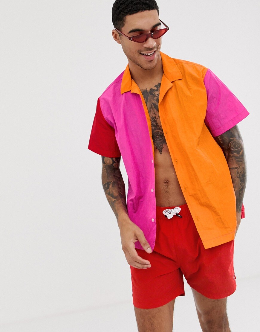 A picture of a model wearing a colour-block shirt. Available at ASOS.