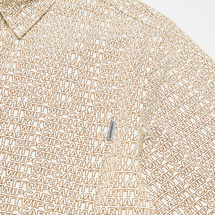 A picture of a shirt by Carhartt WIP featuring an all-over logo print. Available at ASOS.