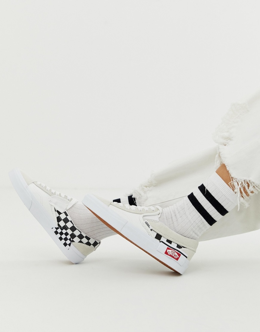 A picture of a pair of slip-on trainers by Vans. Available at ASOS.