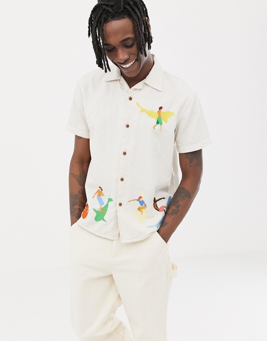 A picture of a model wearing a revere-collar shirt from Kings Of Indigo. Available at ASOS.