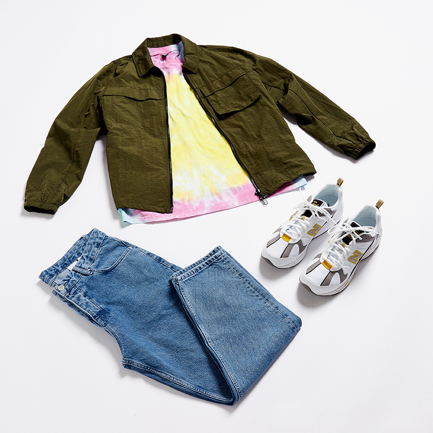 A flat lay outfit including a lightweight jacket, a tie-dye T-shirt, jeans and New Balance trainers. Available at ASOS.