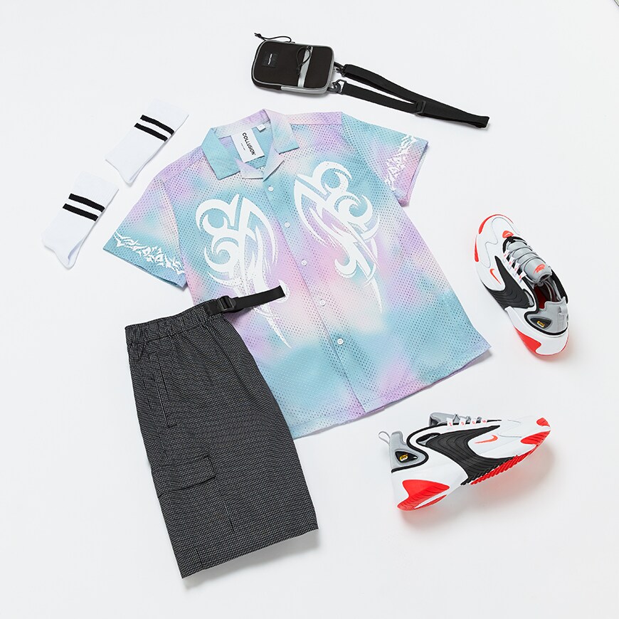 A flat lay outfit of a festival-inspired outfit including a pastel shirt, utility shorts, Nike trainers and accessories. Available at ASOS.