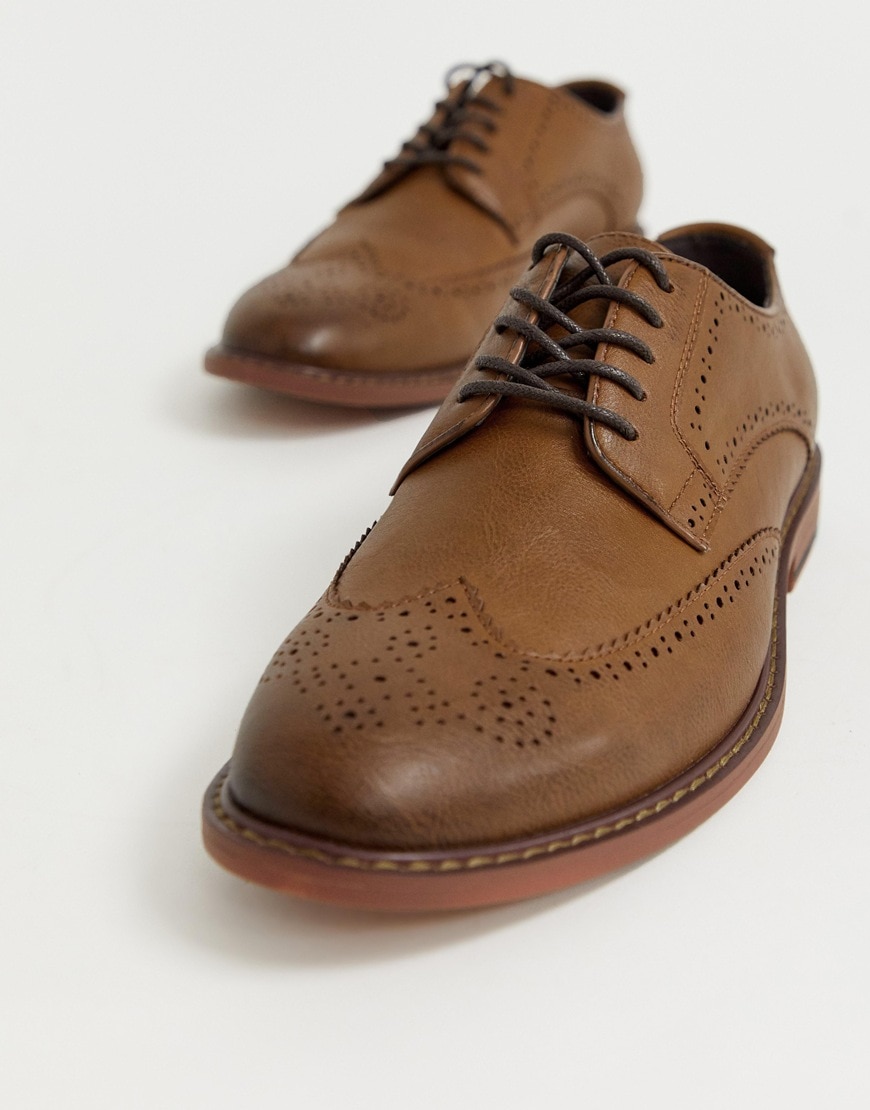 A picture of a pair of brown brogue shoes. Available at ASOS.