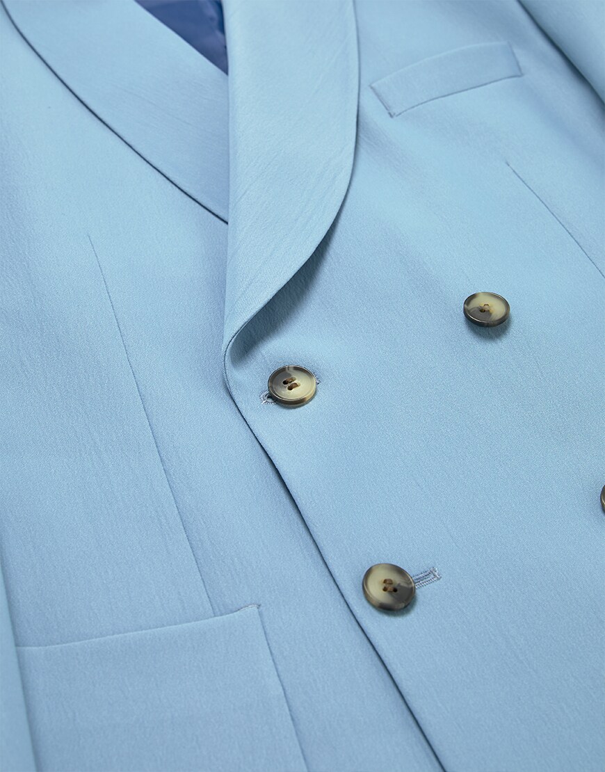 A picture of a bright blue, double-breasted blazer. Available at ASOS.