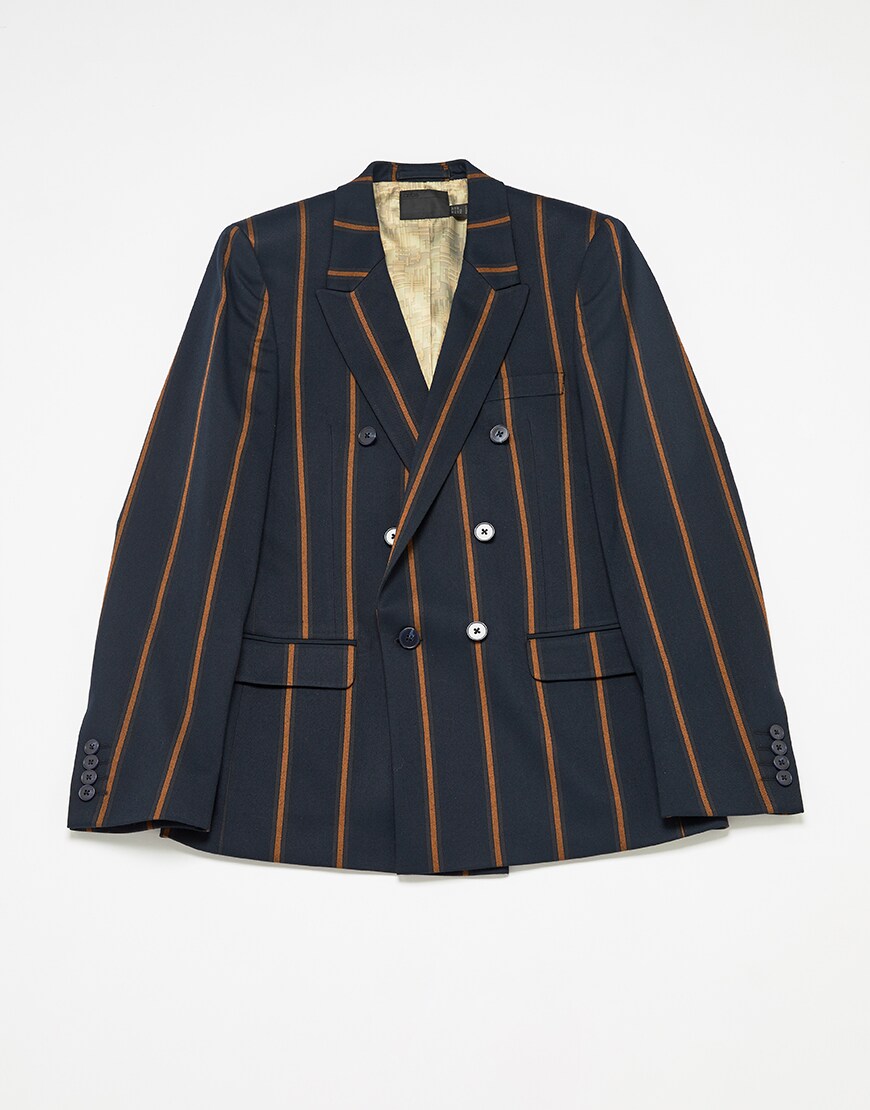 A picture of a navy and orange striped blazer. Available at ASOS.