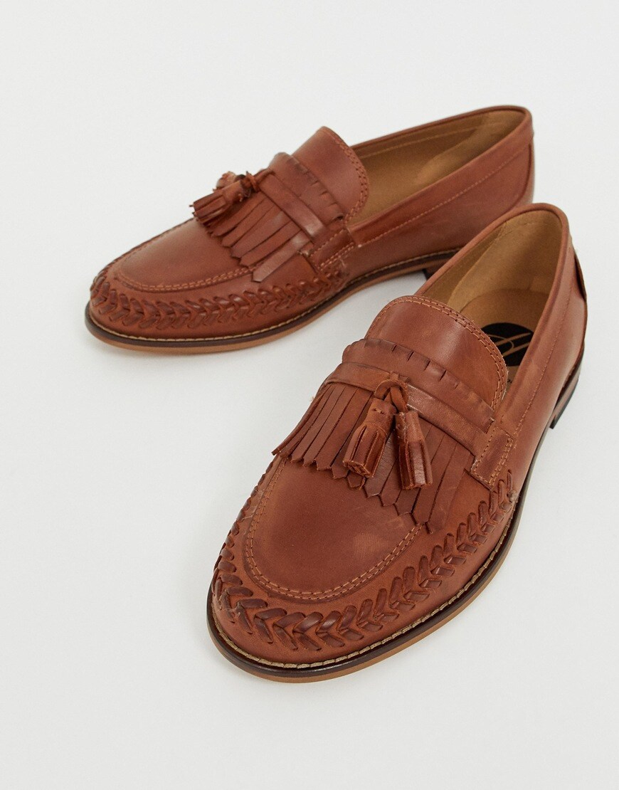 A picture of a pair of tan tassel loafers. Available at ASOS.