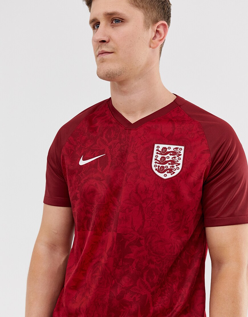 A picture of an ASOSer wearing the Nike England away strip. Available at ASOS.