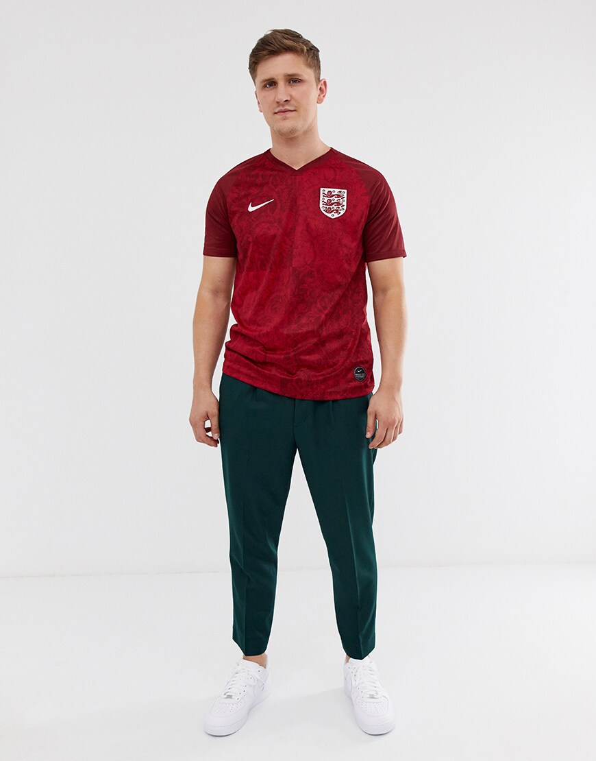 A picture of an ASOSer wearing the Nike England away strip. Available at ASOS.