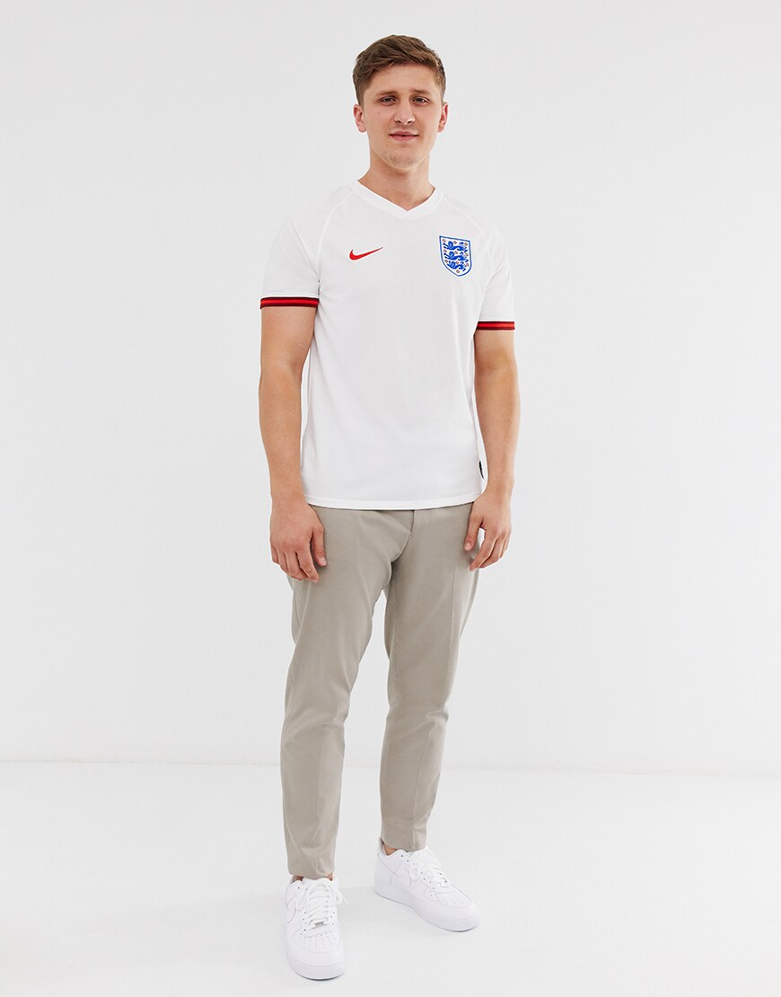 A picture of an ASOSer wearing the Nike England home strip. Available at ASOS.