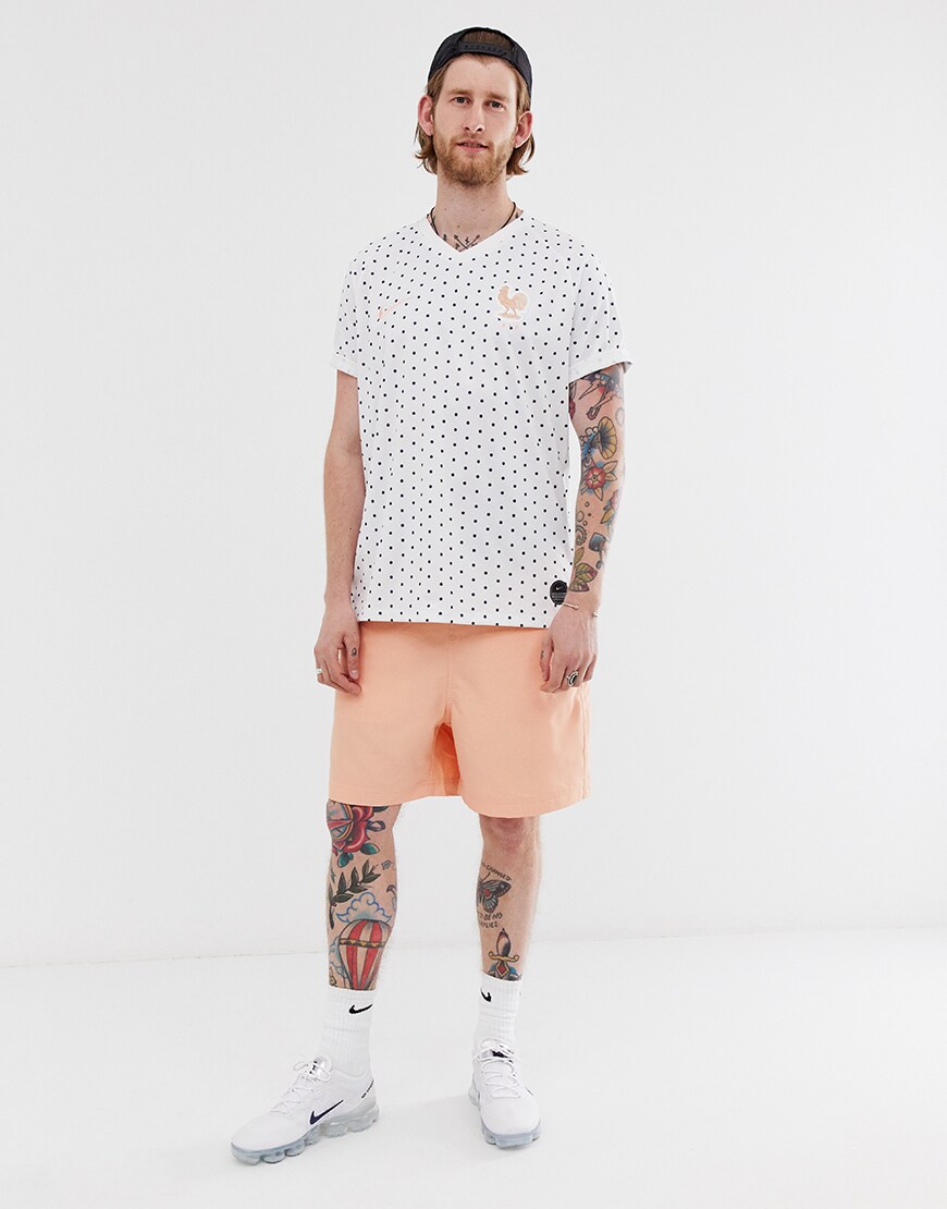 A picture of an ASOSer wearing the Nike France away top. Available at ASOS.
