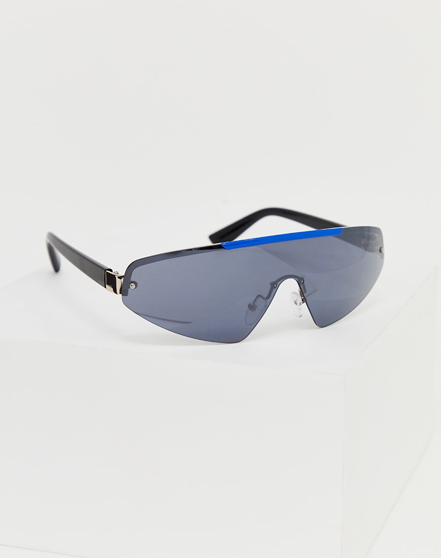 A pair of visor-style sunglasses by ASOS Design. Available at ASOS.le at ASOS