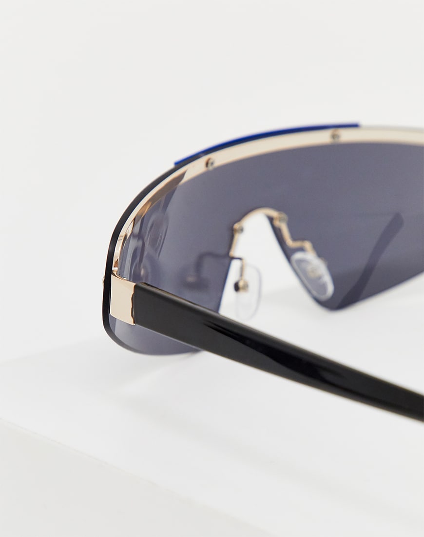 A picture of a pair of visor-style sunglasses by ASOS DESIGN. Available at ASOS.