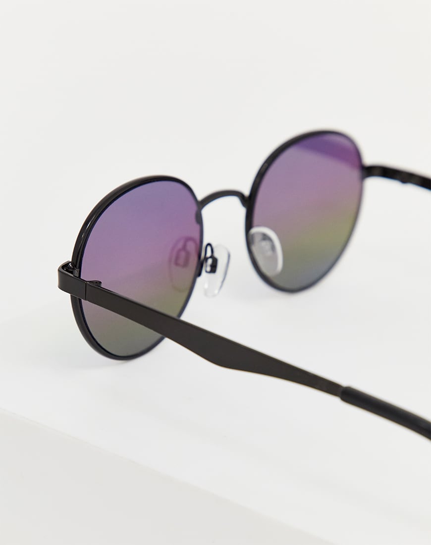 A picture of a pair of round sunglasses with multi-colour lenses. Available at ASOS.