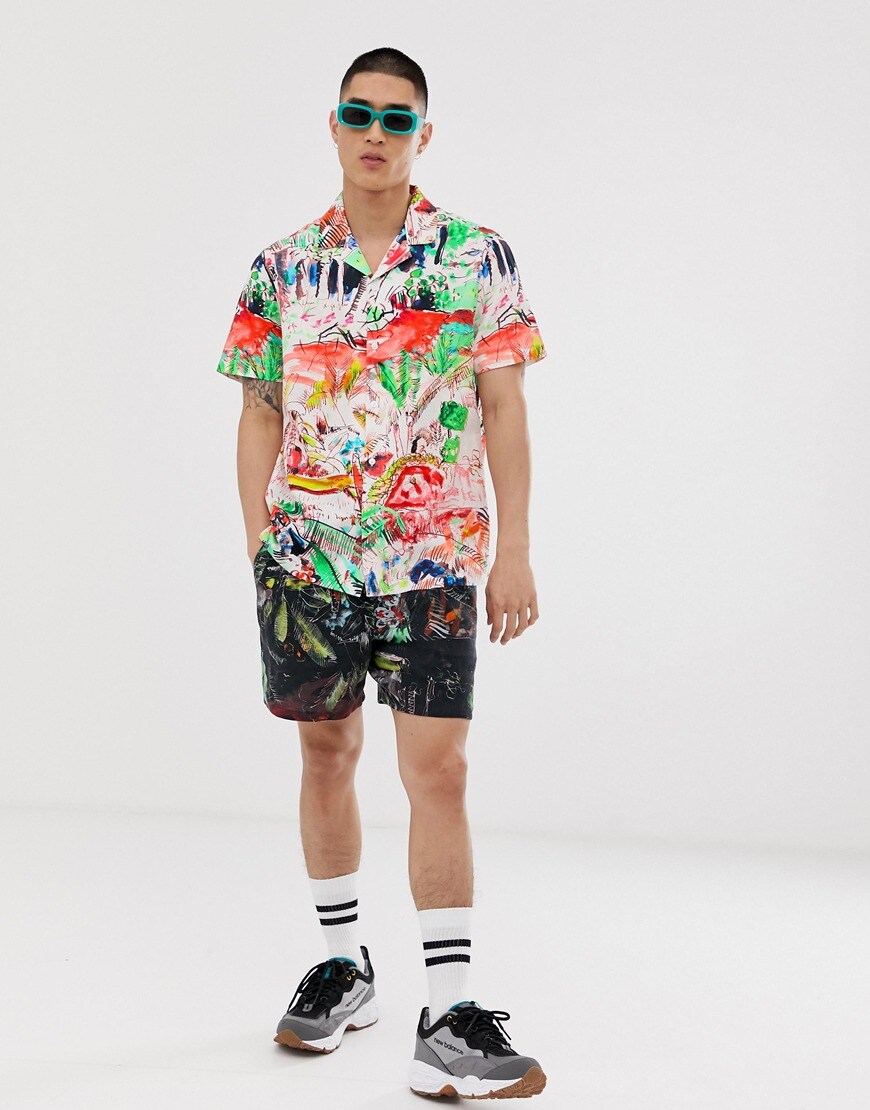 A picture of a model wearing a watercolour print co-ord. Available at ASOS.