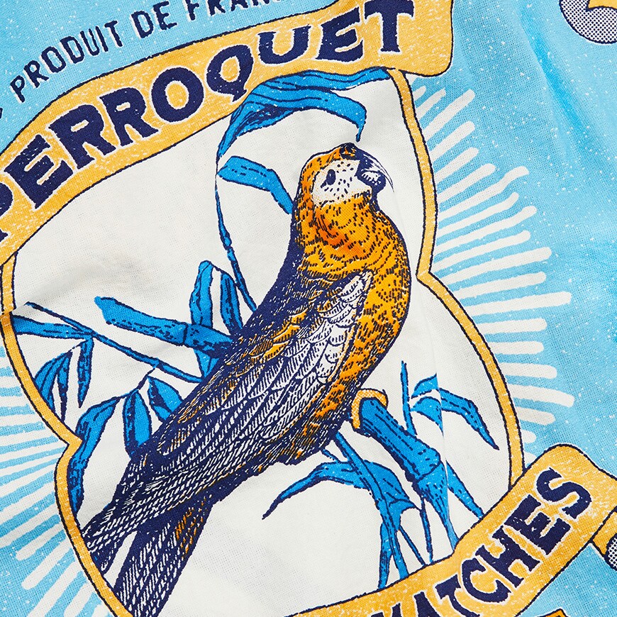 A picture of a blue revere-collar shirt with an oversized parrot print. Available at ASOS.