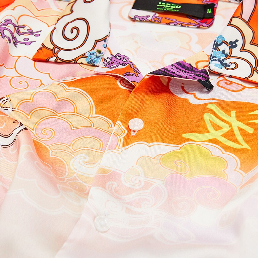 A picture of a revere-collar shirt featuring an oriental-style print. Available at ASOS.